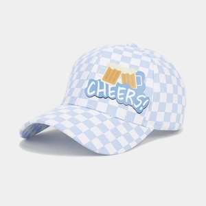 Blue and white checkered Oktoberfest baseball cap with embroidered Cheers beer patch