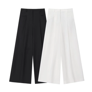 Ensemble pour femme avec haut sans manches à col en V et pantalon large plissé taille haute
