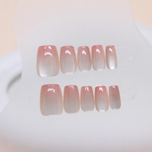 Pink to white gradient cat-eye press-on nails with shimmering velvet magnetic finish