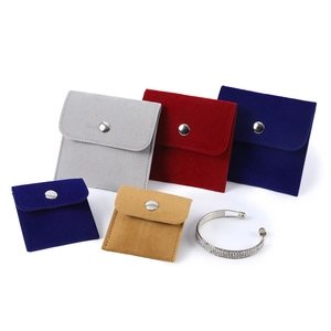 Multi-color velvet jewelry pouches with snap buttons for rings and necklace storage