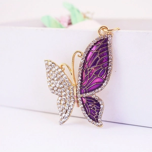 Creative butterfly keychain with gold plating, sparkling rhinestones and purple enamel