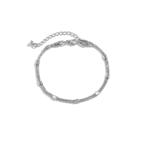 Detail of silver double-layered chain link body jewelry with lobster clasp and extender