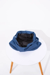 Internal view of navy denim tote bag featuring a black lining and secure metal zipper pocket