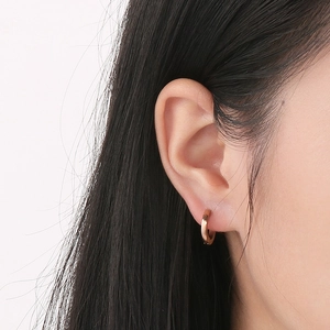 Minimalist rose gold hoop earrings for women showing classic polished stainless steel style