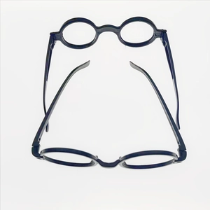 Detailed top view of black round plastic spectacle frames for party costumes and props