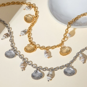 18k gold and silver stainless steel chain bracelet with seashell and conch charms
