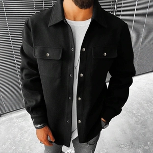 Men's black corduroy shirt jacket with silver buttons and chest pockets in urban style