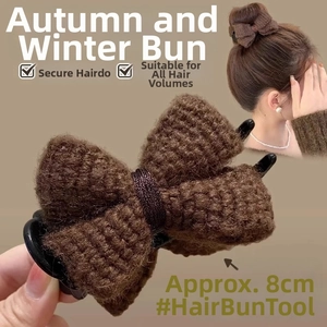 Detail of brown knitted bow hair claw clip showing textured wool fabric and 8cm size