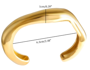 Detailed view of irregular 18k gold plated stainless steel cuff with size dimensions