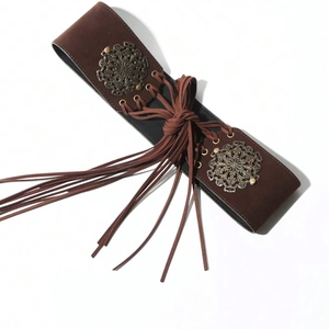Vintage brown suede waist belt with metallic rings, elastic band and tassel ties