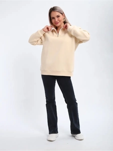 Women's cream half-zip pullover sweatshirt with drop shoulder and ribbed cuffs