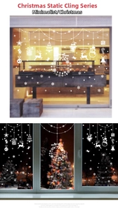 Detailed view of white Christmas reindeer and snowman static window stickers on glass