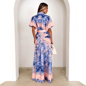 Women's floral print maxi dress with stand collar and waist belt in orange and blue