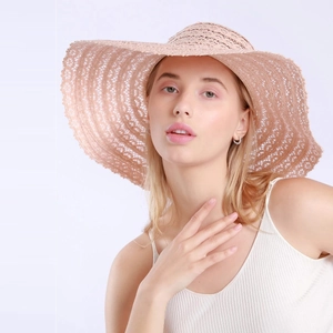 Women summer lace straw sun hat with wide brim and elegant hollow crochet pattern