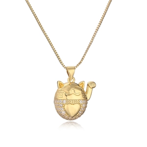 Gold plated Maneki-neko pendant necklace with sparkling zircons and box chain on white
