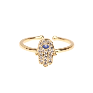 Detailed view of gold Hamsa hand ring with blue evil eye and clear zircon stones