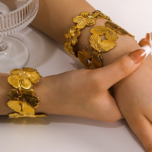 18K gold-plated stainless steel cuff bracelets with floral and butterfly motifs