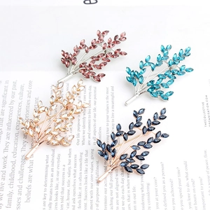 Elegant crystal wheat ear leaf brooches in champagne, pink, peacock blue and navy