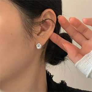 Minimalist 925 sterling silver stud earrings with blue gemstone in irregular disc shape