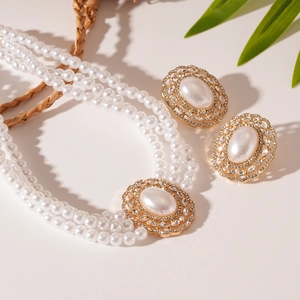 Vintage multi-layer pearl necklace and rhinestone oval earring set in luxury gold finish