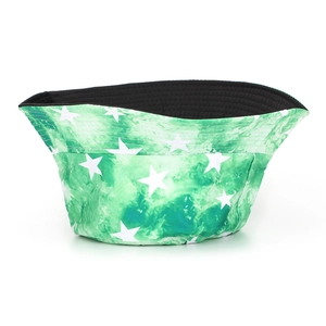 Detailed view of green tie-dye bucket hat with white star print and black inner lining