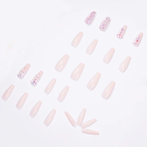 Long nude coffin press-on nails with shiny rhinestones and a smooth polished finish