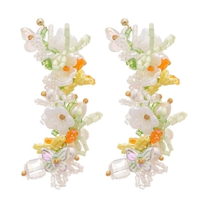 Elegant butterfly tassel earrings with colorful beads and white pearls in a floral design