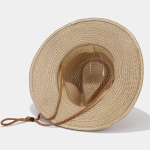 Detail of light beige straw sun hat with adjustable woven chin strap and inner sweatband