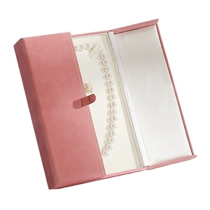 Pink velvet European jewelry box with snap closure featuring pearl necklace and ring display