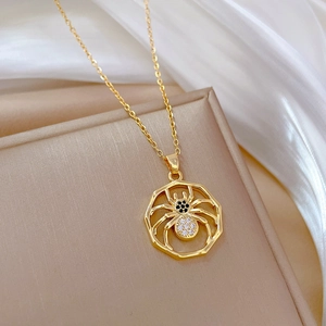 Titanium steel spider necklace with brilliant crystals on champagne silk backdrop