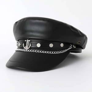 British style black PU leather newsboy cap with anchor charm and silver chain detail