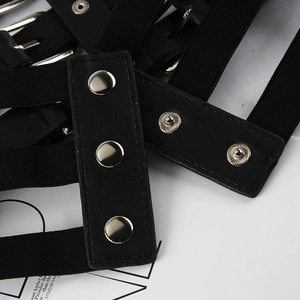 Detailed close-up of black punk style strap with silver rivets and premium leather textures