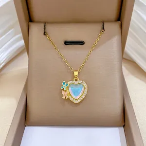 Luxurious gold titanium necklace with iridescent heart pendant and colorful butterflies