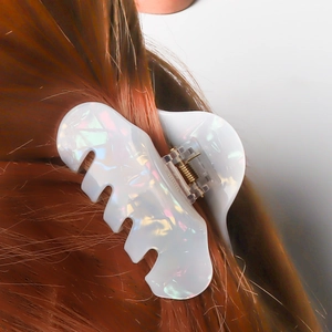Elegant white iridescent shark hair claw clip for women's bun hairstyle styling
