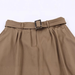 Brown high-waisted midi skirt with matching square buckle belt and twill fabric texture