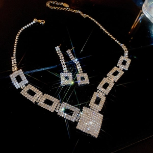 Luxurious silver geometric square necklace and earrings set with sparkling rhinestones