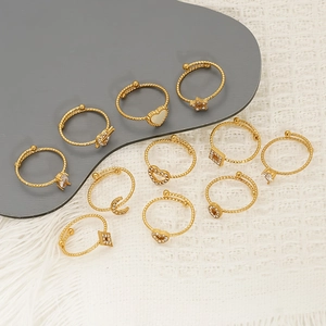 Gold plated adjustable rings set featuring heart moon and star zircon details