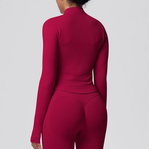 Close-up back view of dark red yoga set showing slimming fit and booty lifting seams