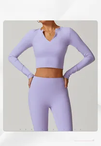 Detail view of lavender yoga set showing high-elasticity fabric and V-neck slim fit