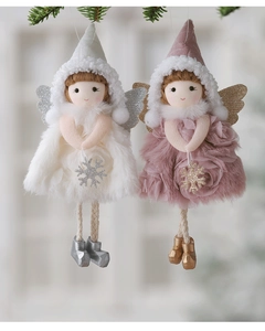 Detail of plush Christmas angel ornaments with sparkling wings and tulle skirts