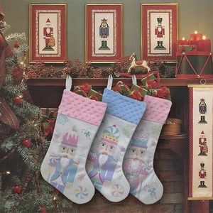 Detailed view of three nutcracker themed Christmas stockings in a festive home setting