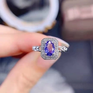 Elegant lavender sapphire open ring with double halo pavé diamonds and twisted band design