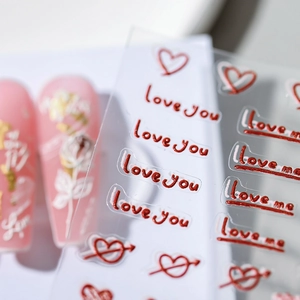 3D embossed heart nail stickers with Love You lettering on pink matte finished nails