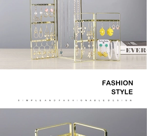 Golden iron jewelry stand featuring a folding screen design for earrings and necklaces