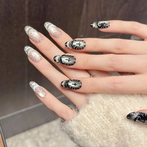 Silver-black gradient press-on nails with Gothic cross and shimmering cat-eye effect