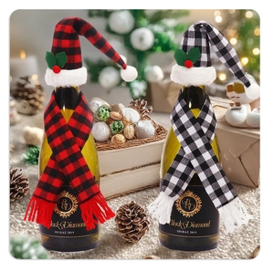 Close-up of Christmas plaid mini hats and scarves on wine bottles with festive decor