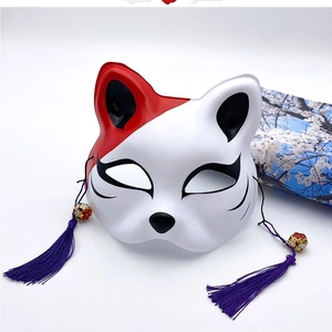 Japanese kitsune fox mask in matte white with red accents and purple tassels