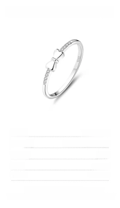 Detail shot of a 925 sterling silver bow ring featuring sparkling cubic zirconia stones