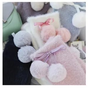 Japanese style plush faux fur pouch with cute ribbon bow and soft pompom details
