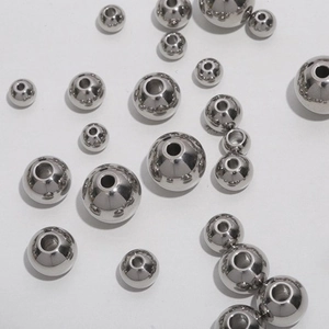 Polished 304 stainless steel beads with holes for jewelry making in various sizes